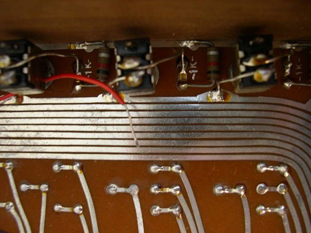 The underside of the input register switches.