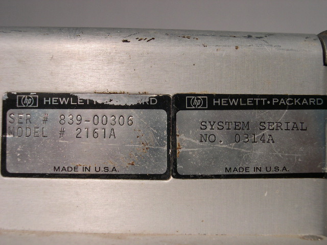 The serial number plates on the power supply.
