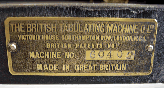 Closeup of the manufacturer's tag showing serial number of this British Tabulating Machine Company Type 001 mechanical keypunch (card punch). This manufacturer's nameplate on this rare keypunch helps us date the keypunch and place it in the timeline of computer history.